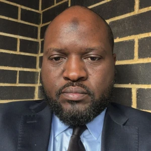 Mr. Usama Kasekende