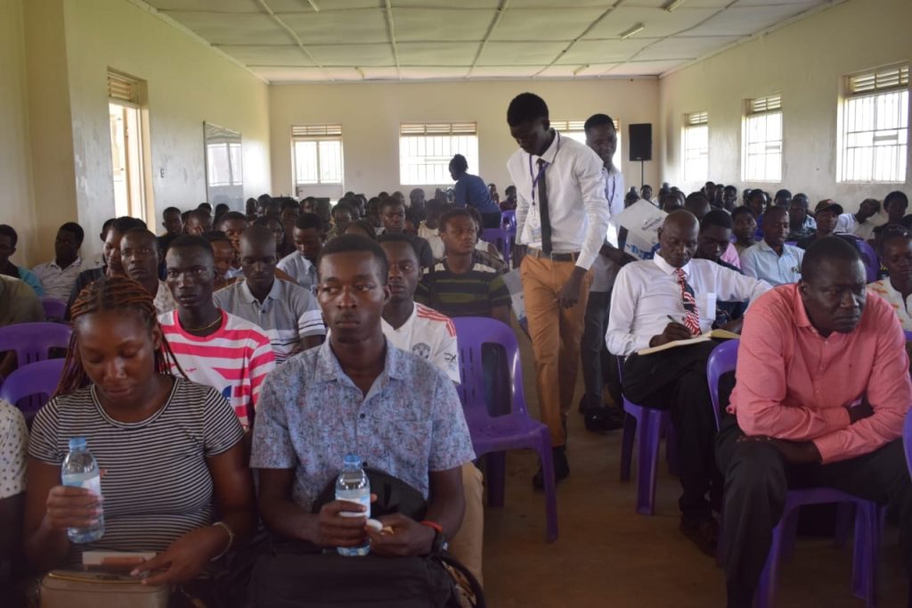 Enthusiastic Joyous fresh students of Lira University attend the orientation event, Dean of Students welcomes them